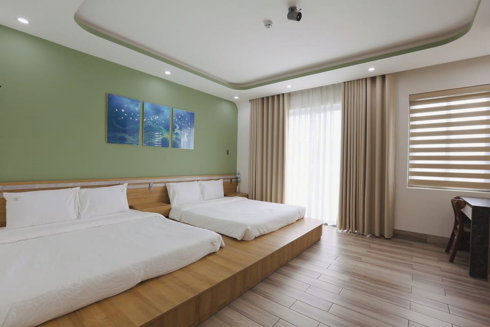 Family Quadruple Room, City View | Desk, iron/ironing board, free WiFi