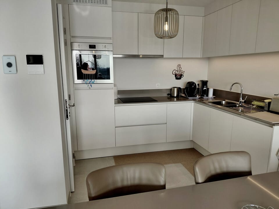 Apartment | Private kitchen | Microwave, highchair