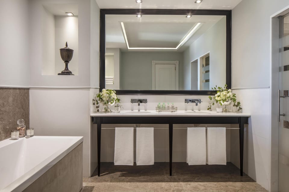 Eco-friendly toiletries, hair dryer, bathrobes, slippers