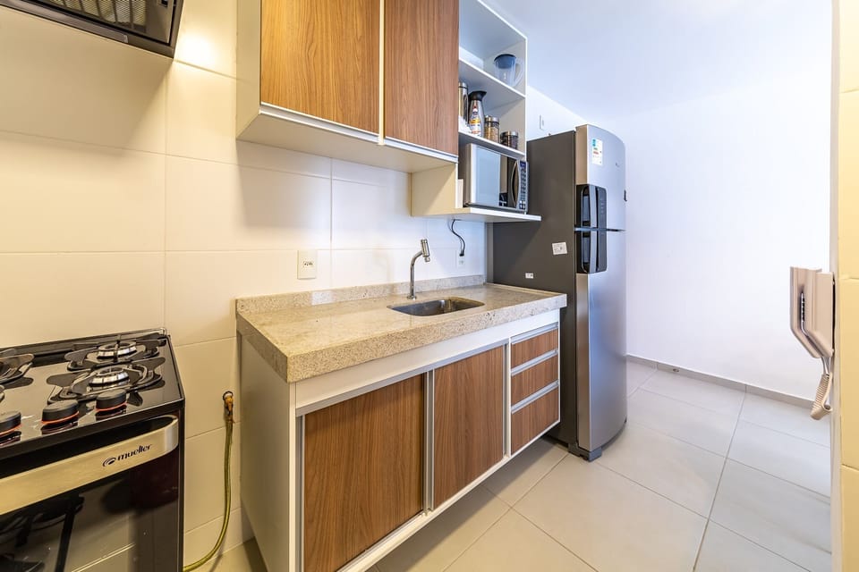 Apartment | Private kitchen | Blender, cookware/dishes/utensils, cleaning supplies, dining tables