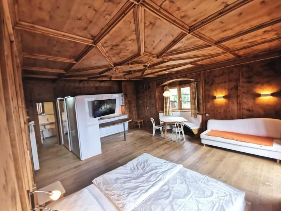 Deluxe Suite, Balcony, Mountain View | Living area | 30-inch flat-screen TV with satellite channels