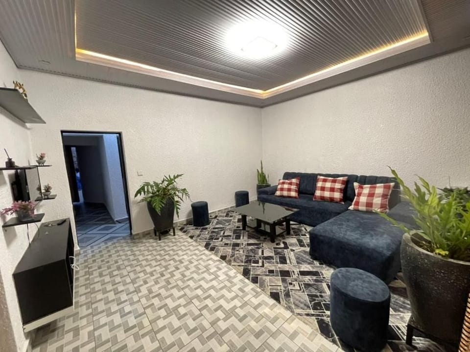 Deluxe Double Room, Garden View | Living area | Fireplace