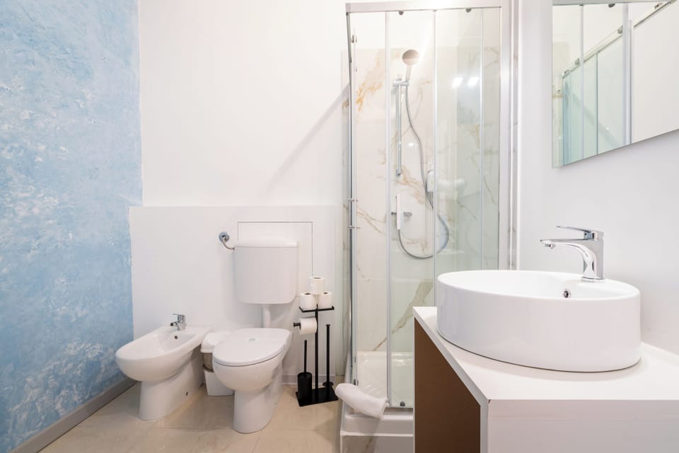 Standard Quadruple Room | Bathroom | Shower, electronic bidet