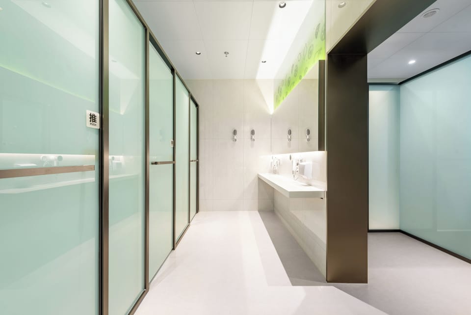 Single Room Shared Bathroom No Window | Bathroom | Shower, designer toiletries, shampoo, toilet paper