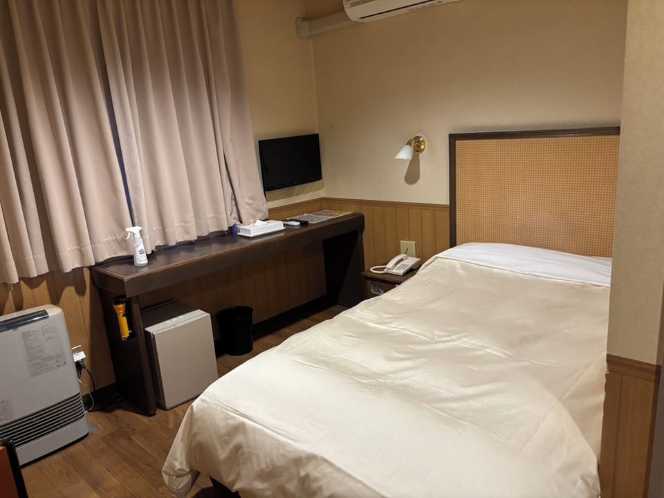 Standard Single Room, Smoking | Down comforters, free WiFi, bed sheets