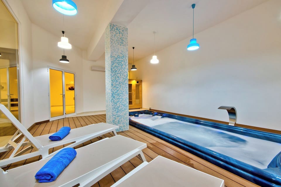 Indoor pool, outdoor pool, sun loungers