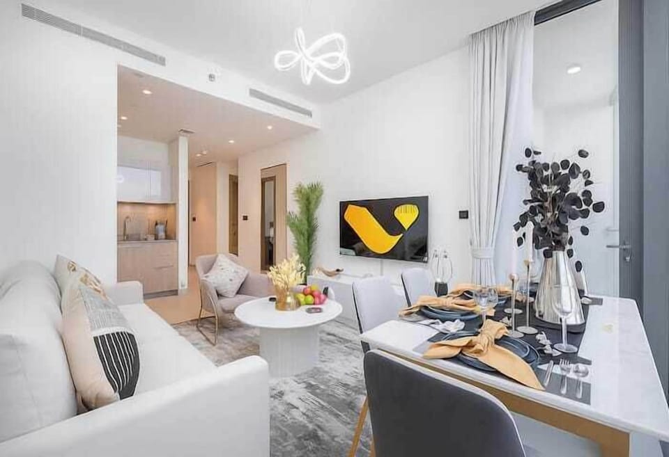 Luxury Apartment, City View | Living area | 65-inch Smart TV with cable channels