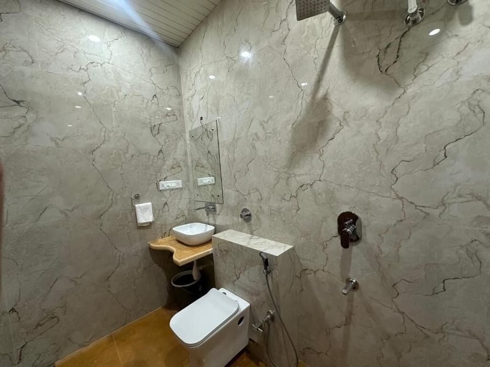 Shower, slippers, towels, soap
