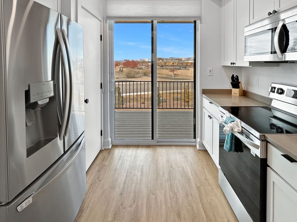 Townhome, 3 Bedrooms | Private kitchen | Coffee/tea maker, fridge, oven, toaster