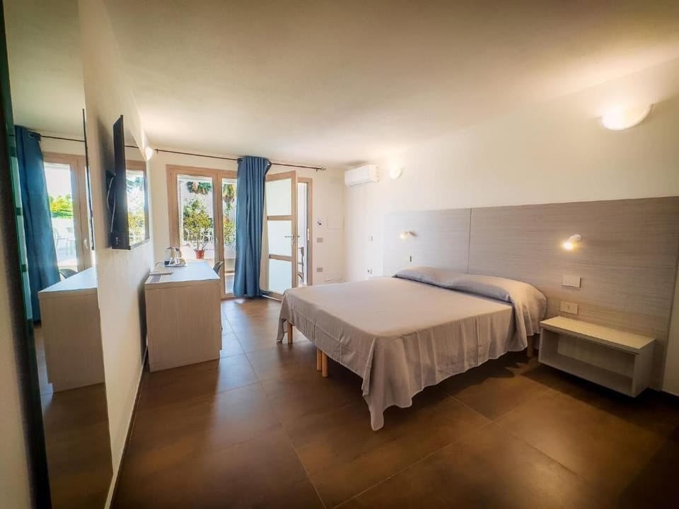 Triple Room, Pool View | Iron/ironing board, free WiFi