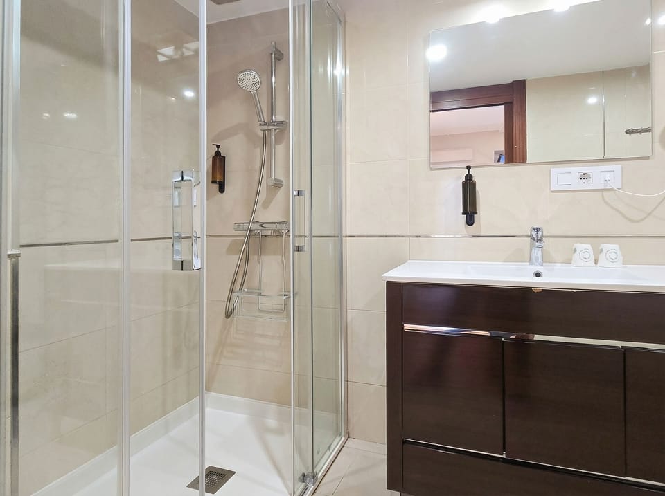 Suite, 1 King Bed with Sofa bed, Balcony, Park View | Bathroom | Shower, hair dryer, towels, soap