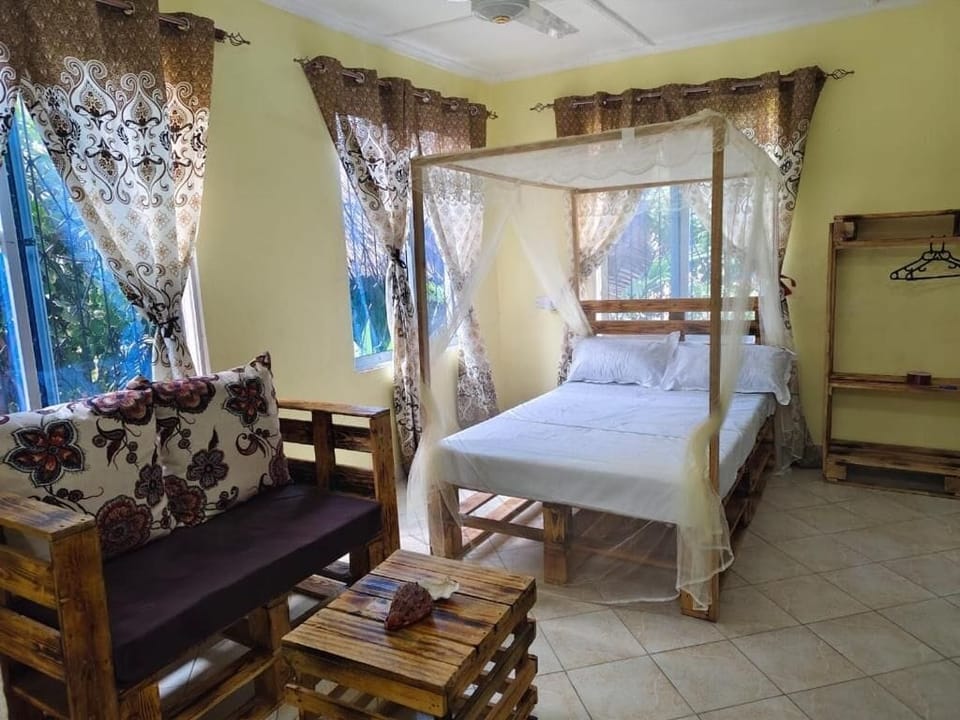 Deluxe Studio Suite | Living area | 32-inch Smart TV with digital channels