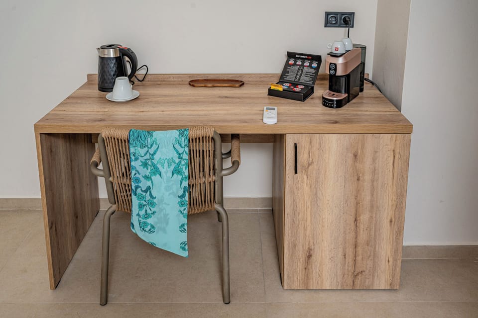 Junior Suite, Sea View | In-room safe, blackout drapes, soundproofing, iron/ironing board