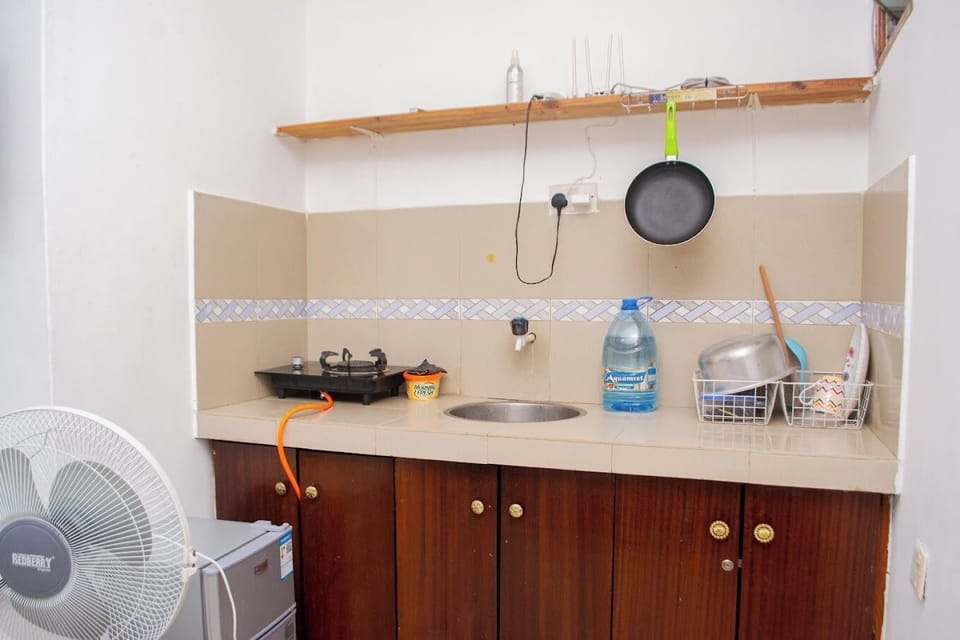 Fridge, microwave, cookware/dishes/utensils