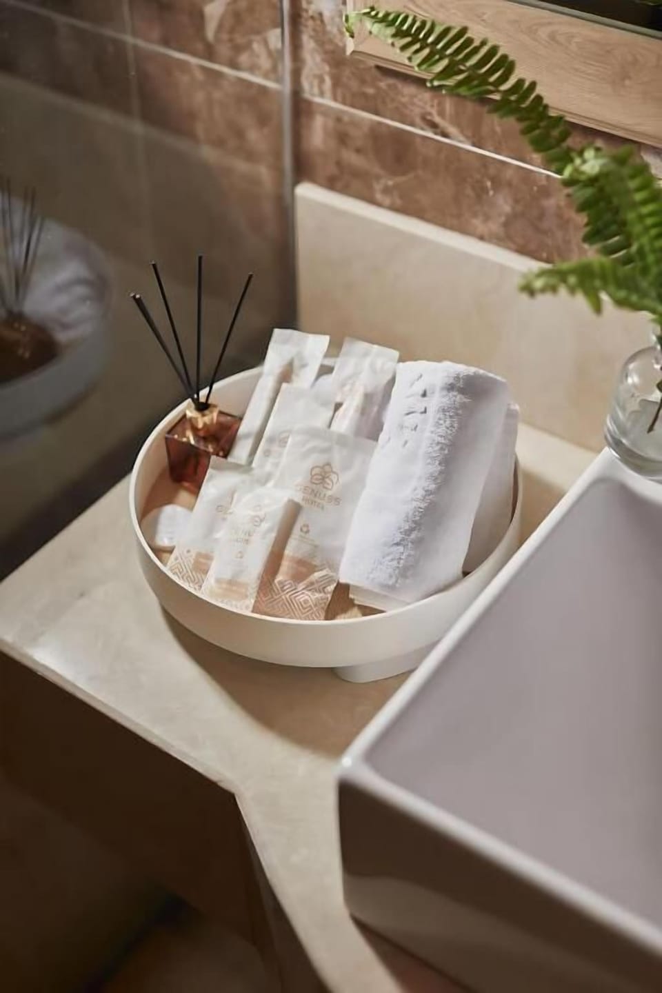 Separate tub and shower, free toiletries, slippers, soap
