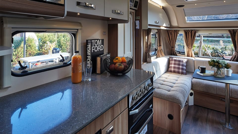 Basic Cabin, Balcony | Private kitchen | Fridge, microwave, cookware/dishes/utensils, dining table