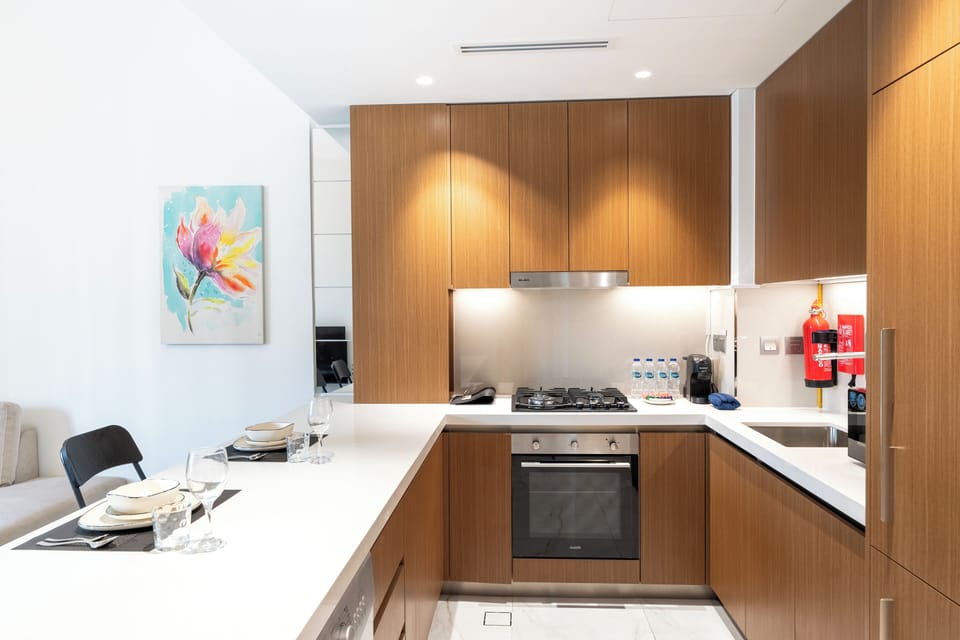 Exclusive Apartment, 1 King Bed, Balcony, Pool View | Private kitchen | Fridge, microwave, oven, stovetop