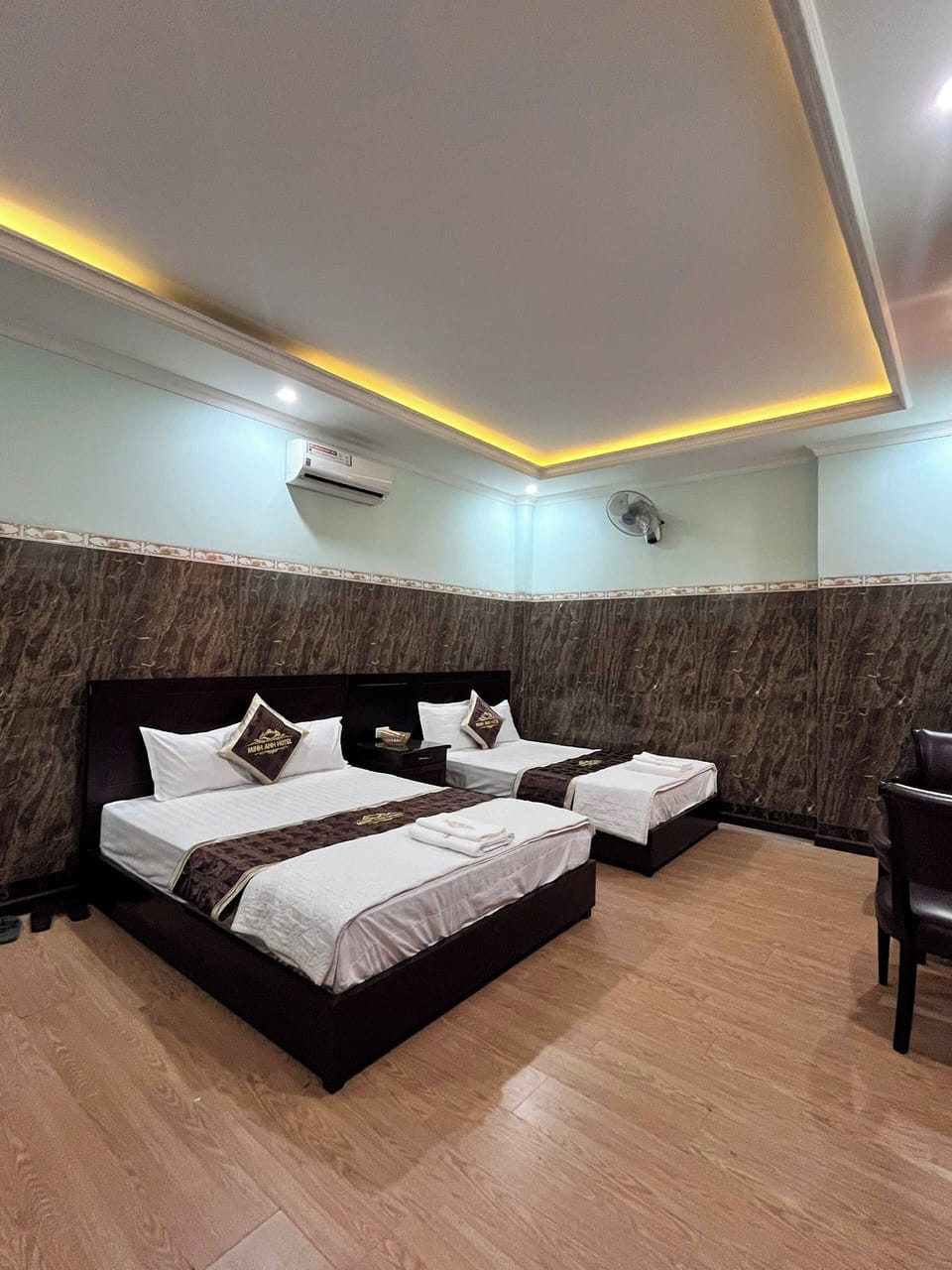 Basic Quadruple Room, City View | Desk, laptop workspace, free WiFi