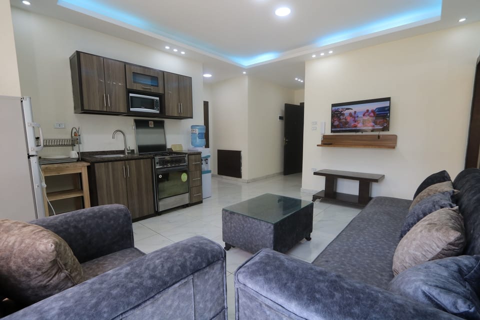 Studio, Balcony, City View | Living area