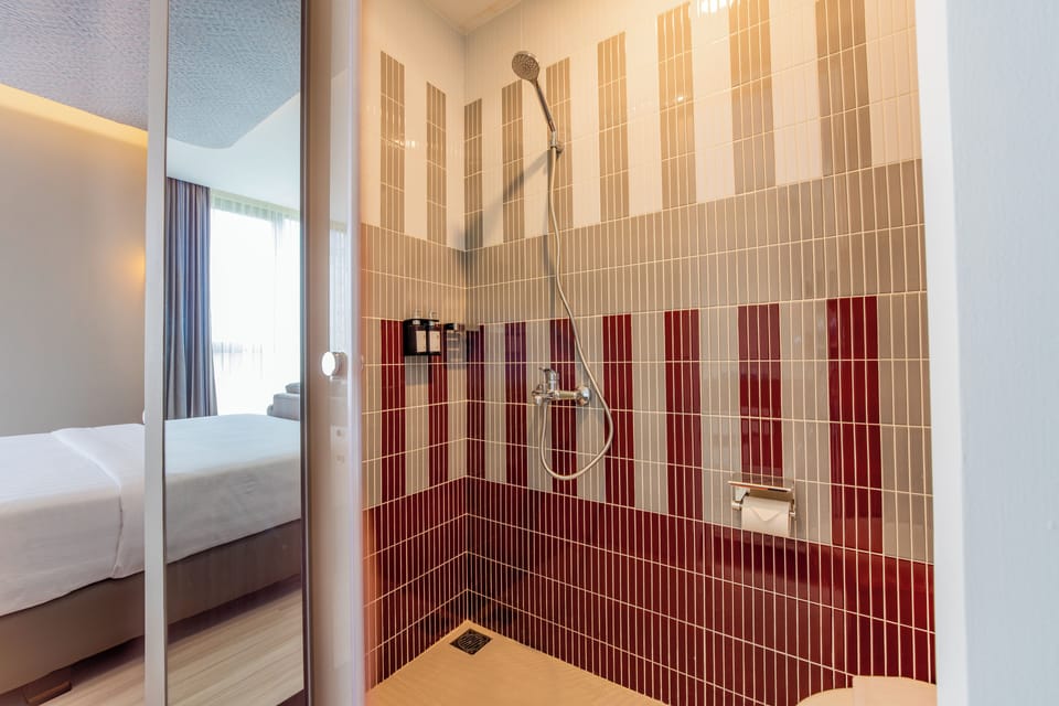 Shower, eco-friendly toiletries, hair dryer, towels