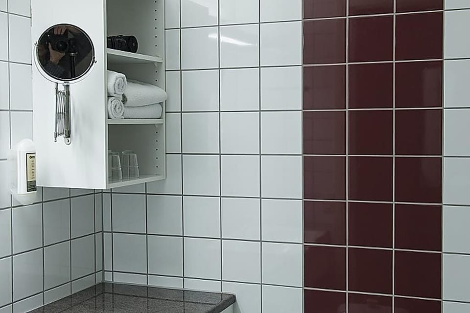 Shower, hair dryer, towels, toilet paper