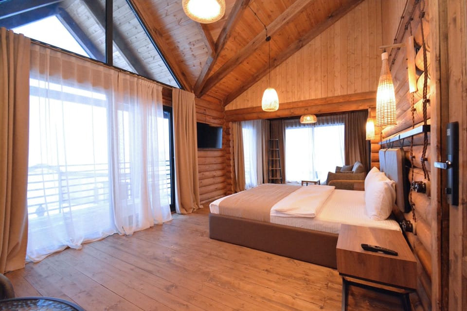 Deluxe Double Room, Mountain View | Premium bedding, desk, laptop workspace, blackout drapes