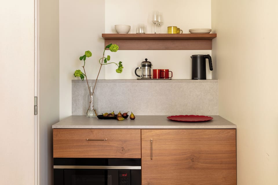 Standard Studio Kitchenette | Private kitchenette | Coffee/tea maker, shared fridge, shared microwave