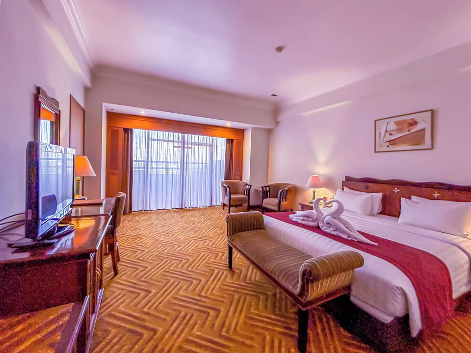 Deluxe Room (B2B) | Premium bedding, in-room safe, desk, iron/ironing board (on request)