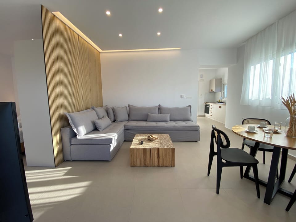 Comfort Apartment | Living area | Flat-screen TV