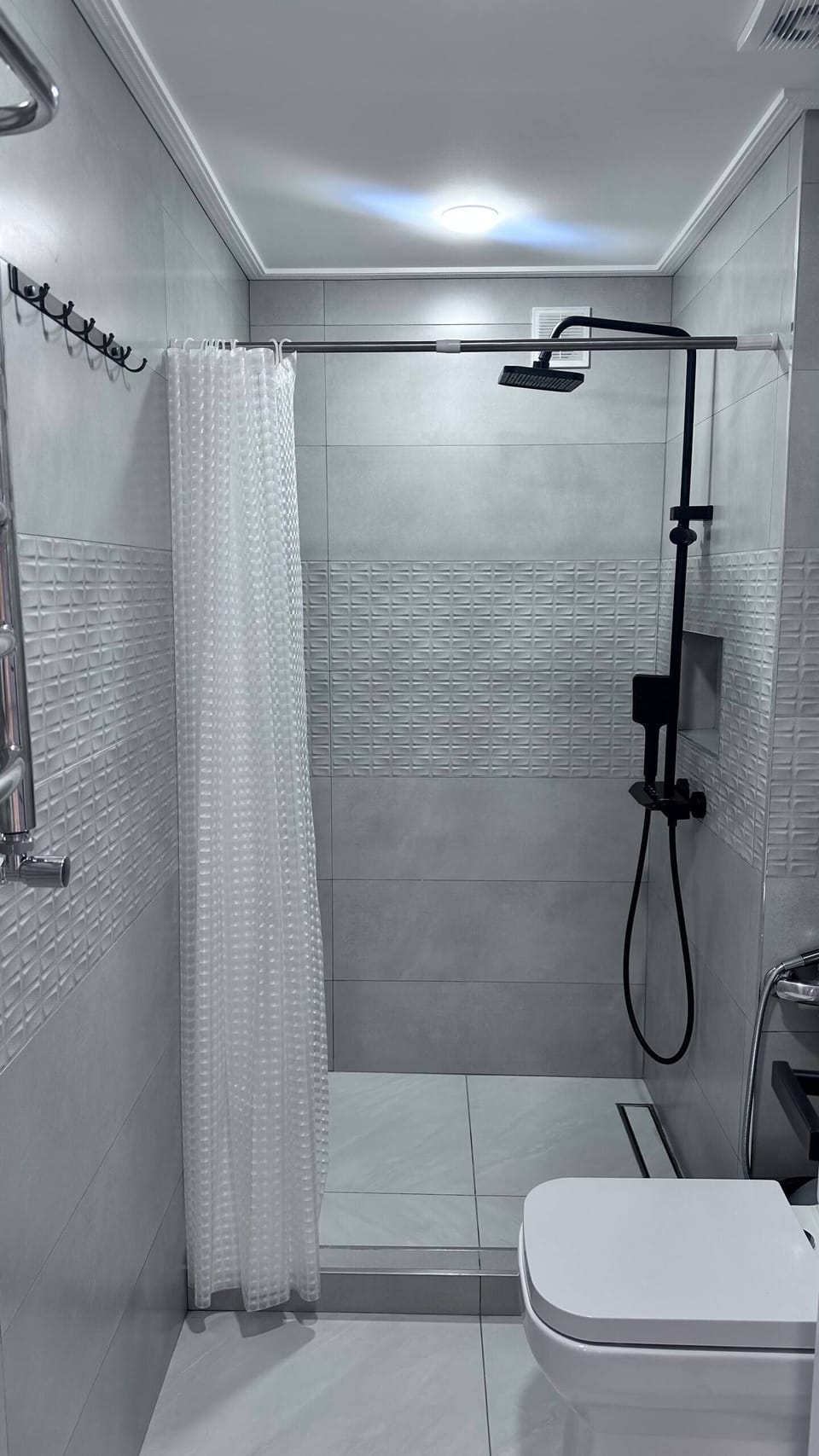 Deluxe Triple Room, Garden View | Bathroom | Shower, hair dryer, towels, soap