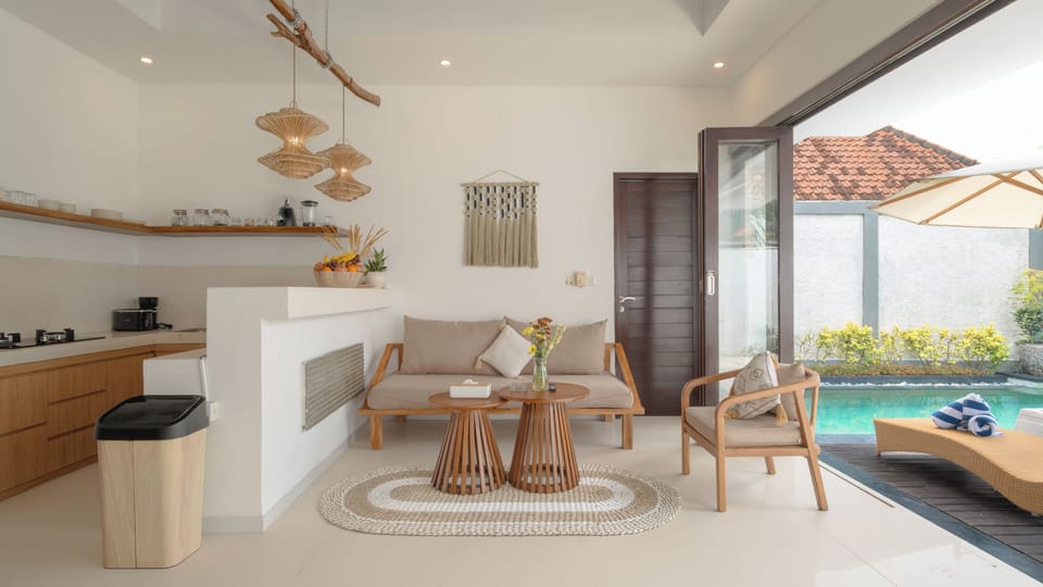 Villa, Pool View | Living area | 43-inch Smart TV with cable channels