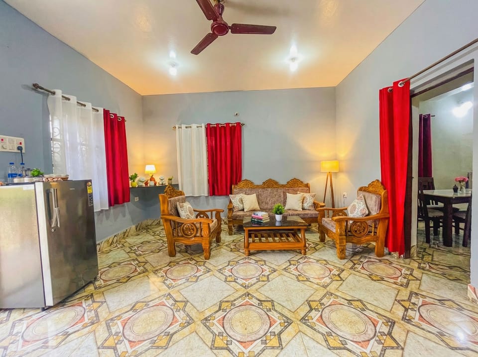 Comfort Villa, Multiple Bedrooms, Balcony, City View | Living area | 32-inch LCD TV with digital channels