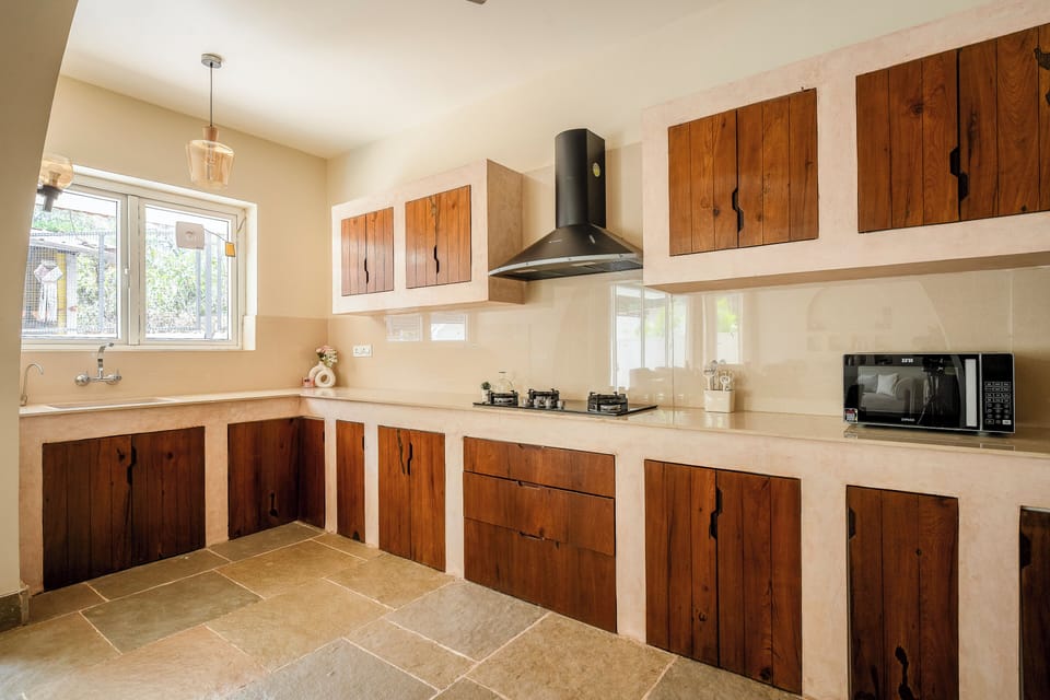 Villa | Private kitchen | Electric kettle, dining tables