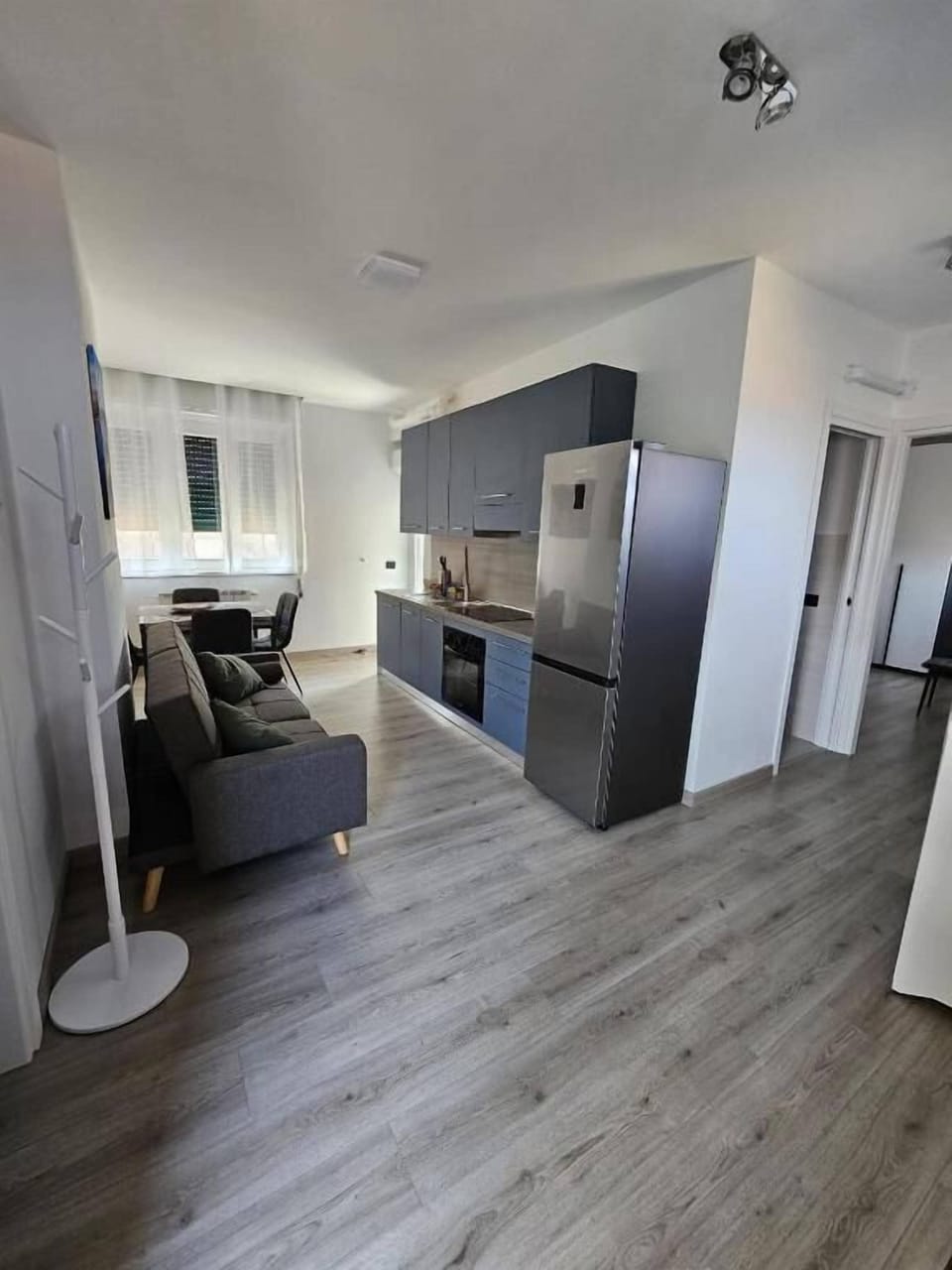 Apartment, Balcony, Lake View | Living area | Flat-screen TV