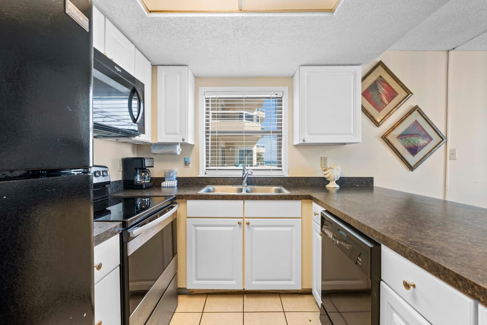 Condo, Multiple Beds (Sunswept 201) | Private kitchen | Oven, toaster