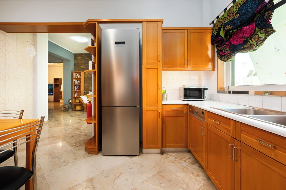 Deluxe Apartment, Balcony, City View | Private kitchen | Full-size fridge, microwave, oven, stovetop