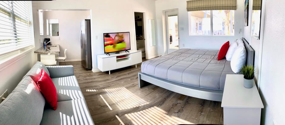 Exclusive Studio Suite, 1 King Bed, Kitchenette, Beach View | Select Comfort beds, iron/ironing board (on request), WiFi (free)