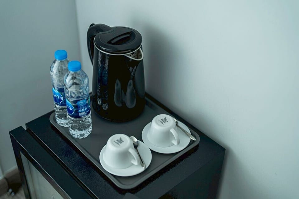 Deluxe Double Room, Balcony, Garden View | Coffee and/or coffee maker