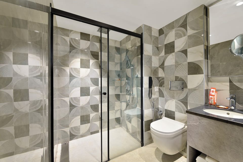 Shower, hair dryer, slippers, towels