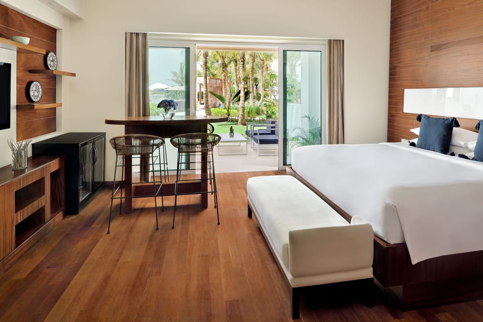 Premium bedding, down comforters, minibar, in-room safe