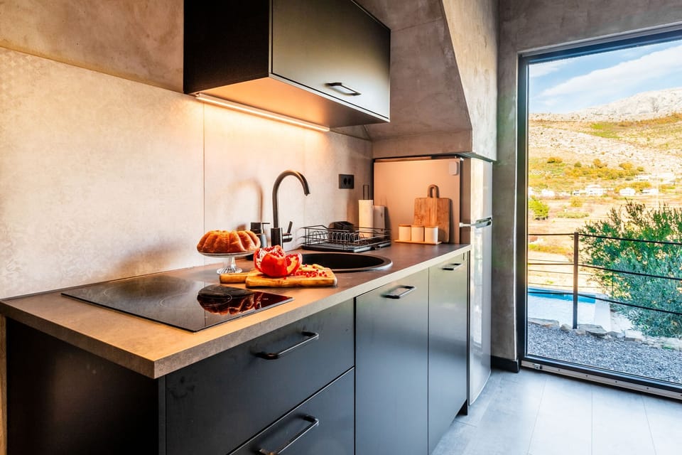 Villa | Private kitchen | Fridge, microwave, stovetop, electric kettle