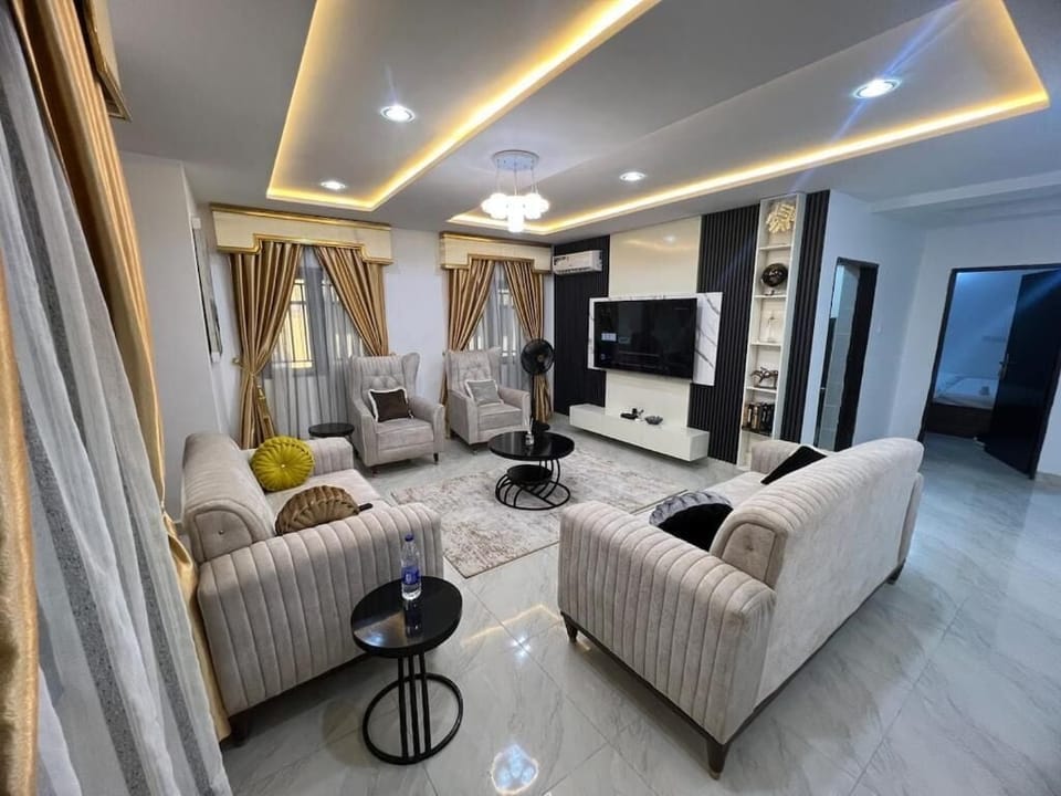 Family Apartment, Balcony, City View | Living area | Flat-screen TV