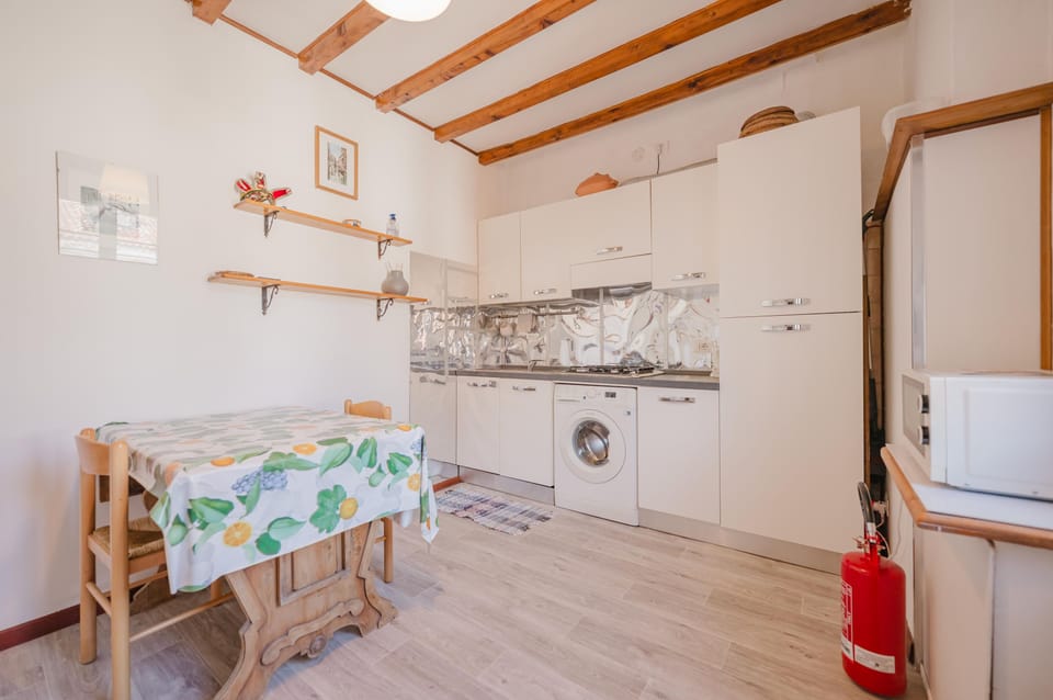 Apartment | Private kitchen | Fridge, microwave, stovetop, espresso maker
