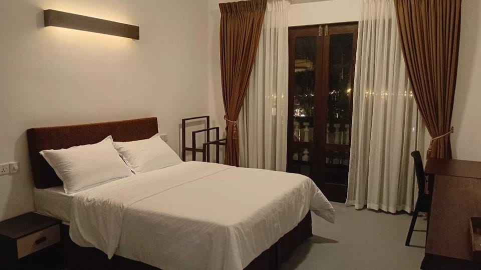 Desk, laptop workspace, free WiFi, bed sheets
