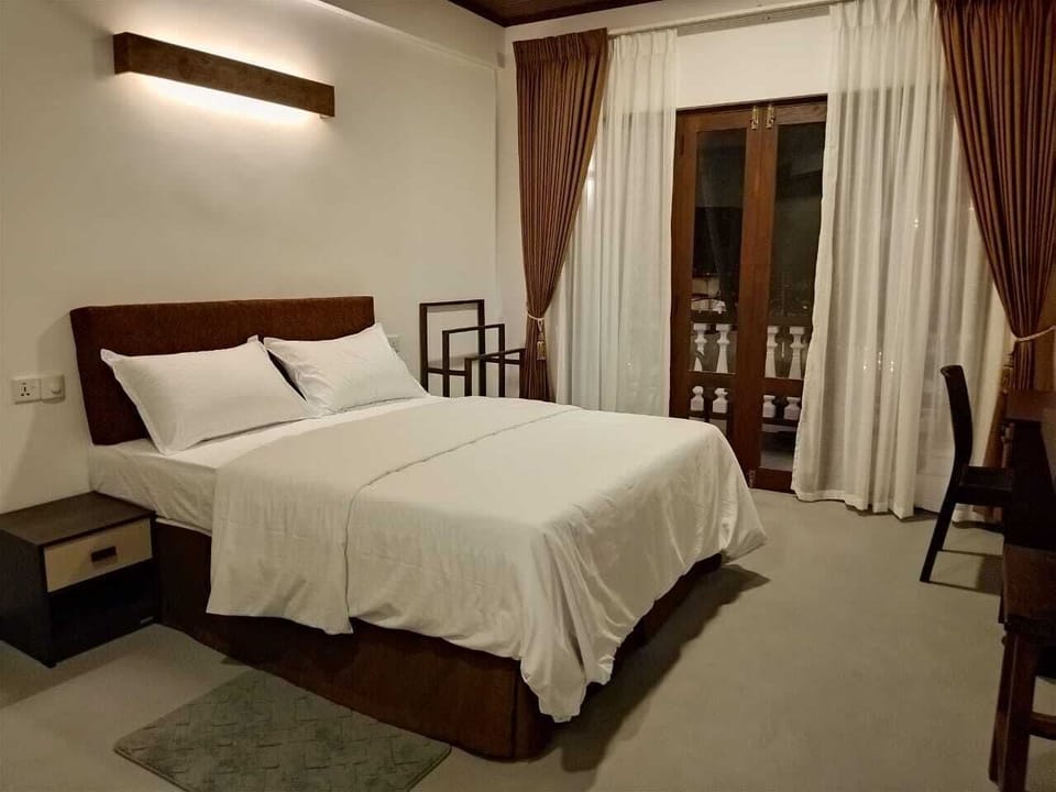 Desk, laptop workspace, free WiFi, bed sheets