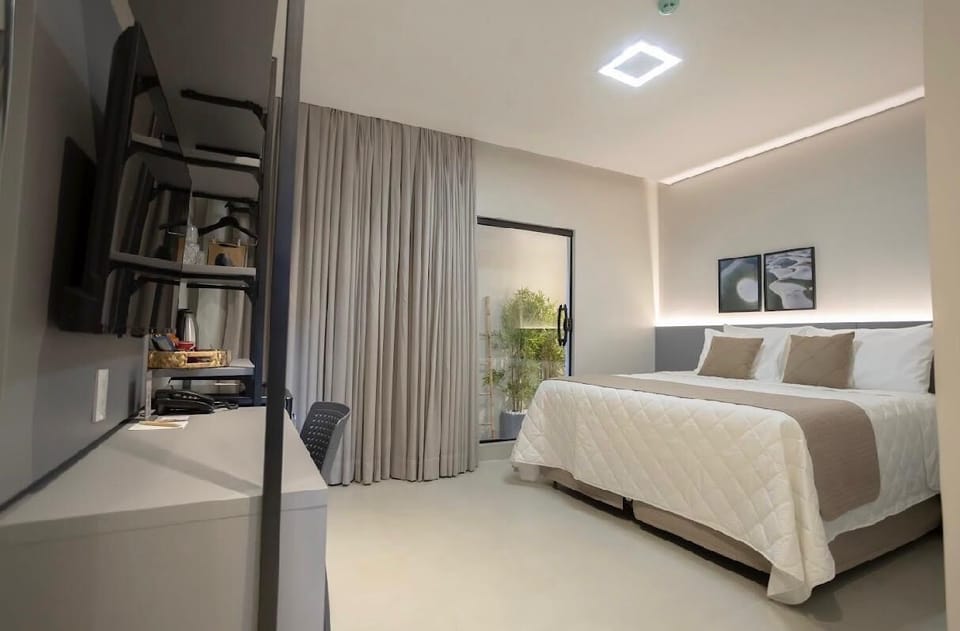 Deluxe Double or Twin Room | Minibar, in-room safe, individually furnished, desk