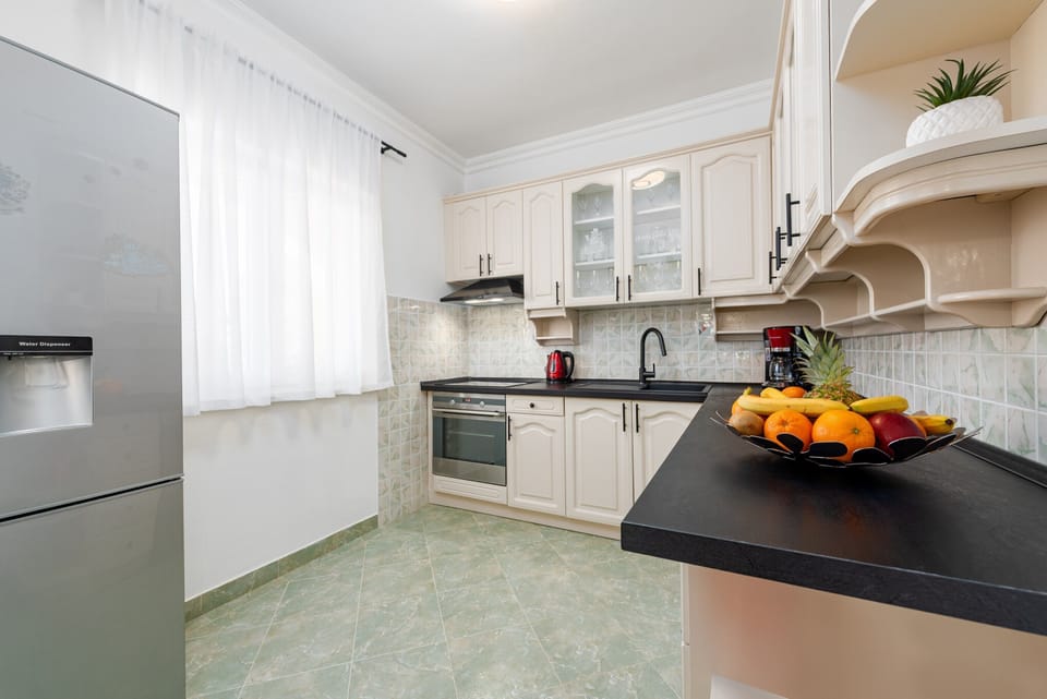 Standard Apartment, Garden View | Private kitchen | Full-size fridge, microwave, oven, stovetop
