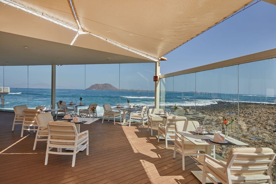 3 bars/lounges, swim-up bar, beach bar