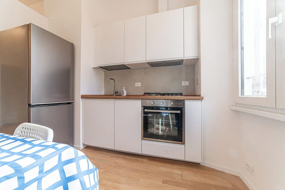 Superior Apartment, Courtyard View | Private kitchen | Fridge, oven, stovetop, dishwasher