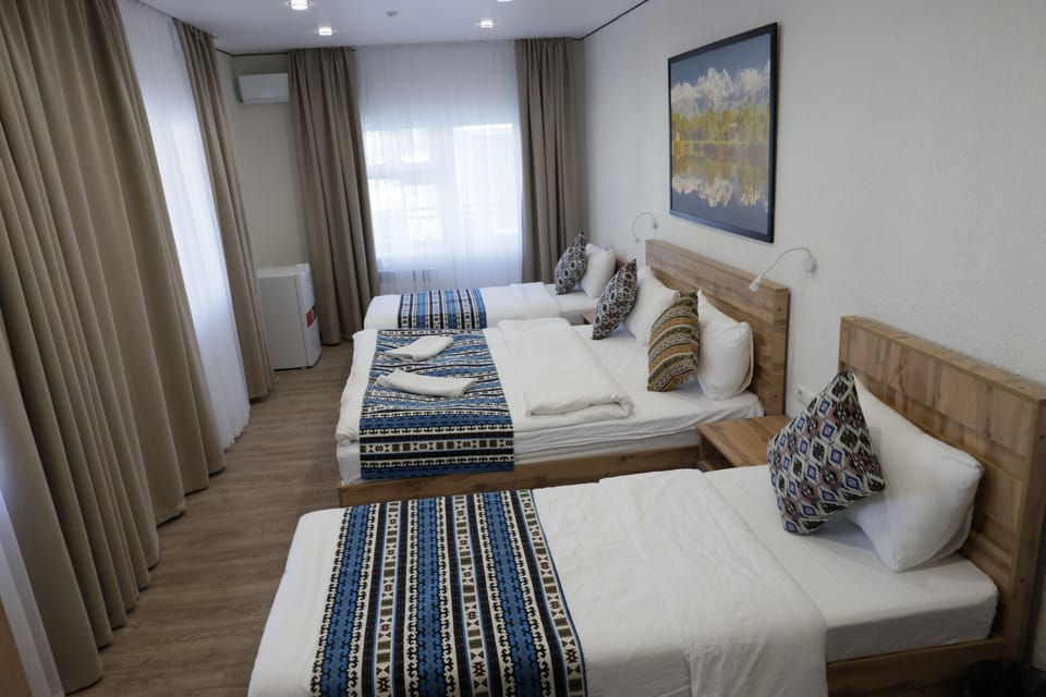 Standard Quadruple Room, Pool View | Free WiFi